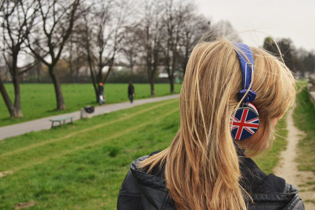 A girl with headphones (Britain)
